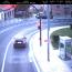 Secuencia de fotografías de un vehículocometiendo una infracción al saltarse elsemáforo en rojo en la Calle CuestaDehesa Serena